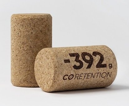 Two Amorim micro-agglomerate corks, one printed with -392 g CO2 retention
